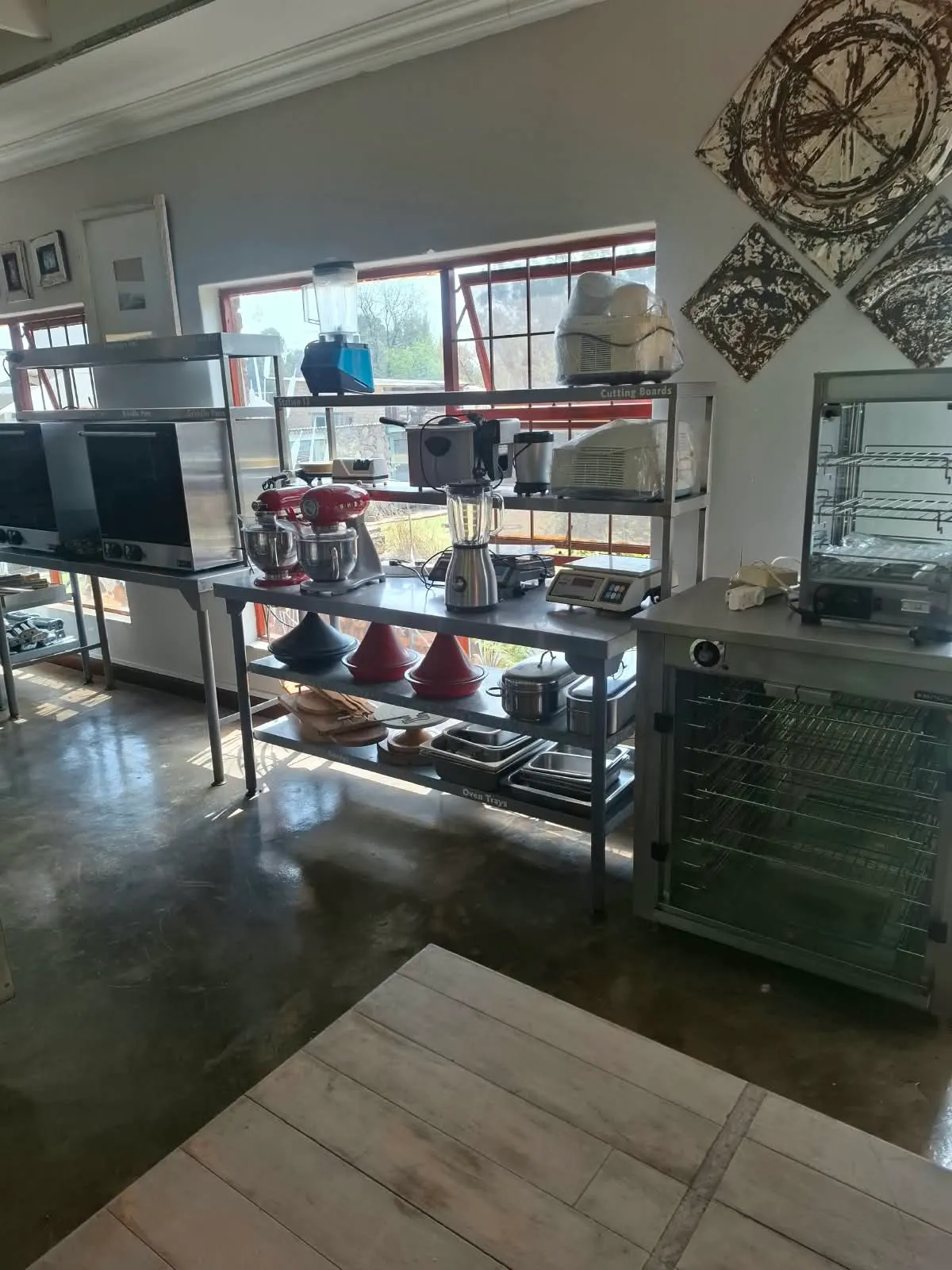 Station 12 with stand mixers, tagines, blenders and oven trays