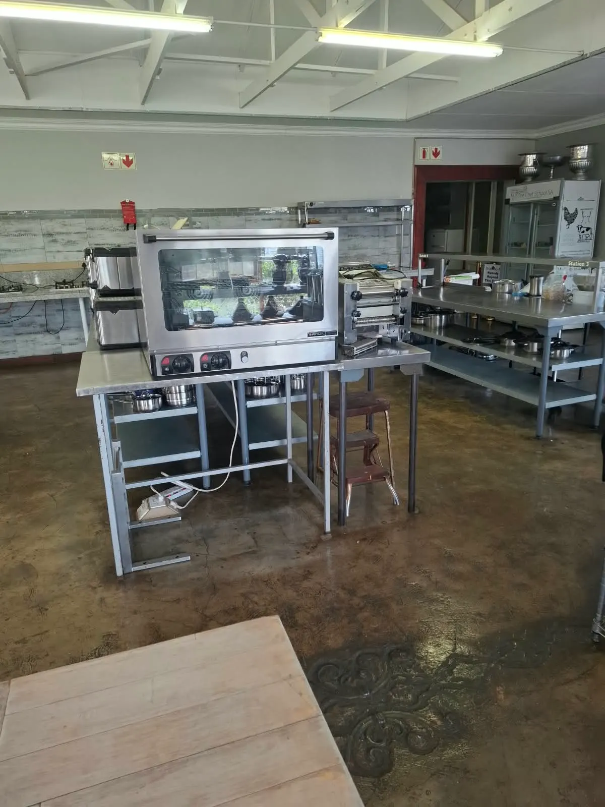 Convection oven and pasta machine at a training station
